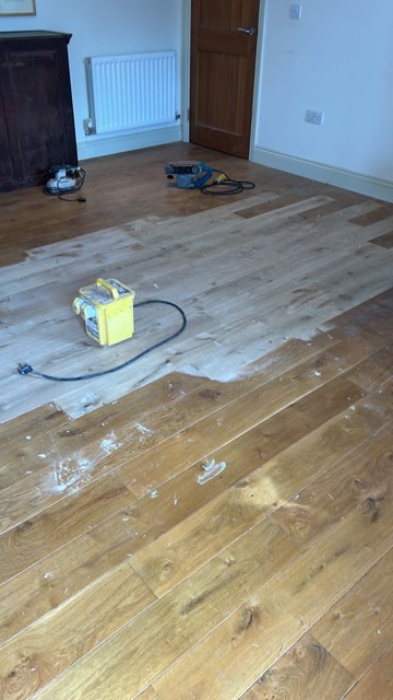 Oak floor being laid and finished